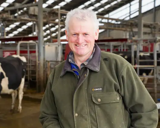 Bruce Dinnington in front of his Lely Astronaut A4 milking robots